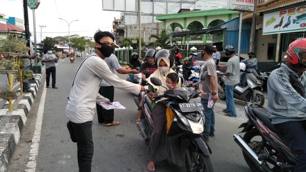 Tolak Money Politics, AMAMP Bontang Beri Edukasi Lewat Brosur 